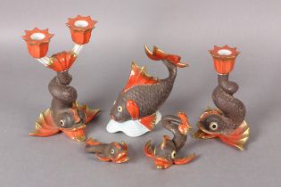 A HEREND PORCELAIN SUITE OF FLYING FISH TABLE DECORATIONS including a twin light light candelabra