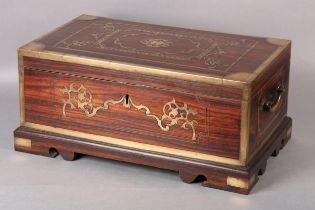 A 19TH CENTURY ANGLO-INDIAN ROSEWOOD AND BRASS BOUND WORK BOX inlaid to the top and front with brass