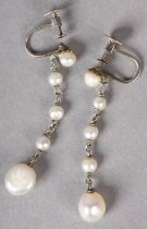 A PAIR OF BAROQUE AND SEED PEARL EAR PENDANTS c1930 in 9ct white gold each with an approximate 8mm x