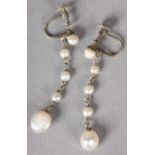 A PAIR OF BAROQUE AND SEED PEARL EAR PENDANTS c1930 in 9ct white gold each with an approximate 8mm x