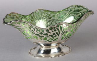 A GEORGE V SILVER BOAT SHAPED BASKET, Sheffield 1932 maker's mark for Sydney Hall & Co, with pierced