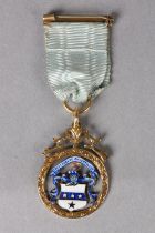 A HERIOT CLUB SPORTING MEDAL IN 15CT GOLD, c1920, pierced and scroll engraved and champlevé