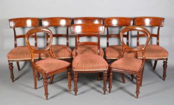 A SET OF SIX VICTORIAN MAHOGANY DINING CHAIRS, each having a bar top rail, upholstered seat on