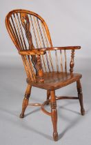 A LATE 18TH CENTURY YEW-WOOD WINDSOR ARMCHAIR, having a pierced splat and rail back, elm seat,