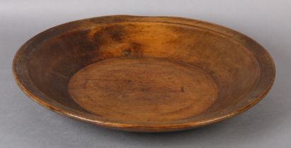 AN 18TH CENTURY/EARLY 19TH CENTURY TURNED BEECHWOOD DAIRY BOWL, 45.5cm diameter