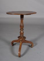 A MID 19TH CENTURY MAHOGANY OVAL TRIPOD TABLE, on slender turned pedestal and inwardly curved