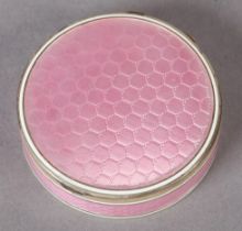 A .925 SILVER AND ROSE PINK BASSE TAILLE ENAMEL BOX, Birmingham 2012, circular with silver gilt