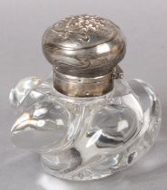 A LATE 19TH CENTURY CONTINENTAL SILVER MOUNTED GLASS INKWELL, of rounded writhen lobed outline, with