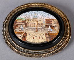 AN EARLY 19TH CENTURY GRAND TOUR MICRO MOSAIC BROOCH in 14ct gold, the oval landscape of St Peter'