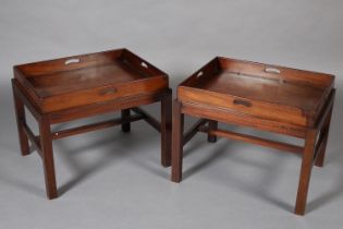 A PAIR OF MAHOGANY LOW SET BUTLER'S TRAYS, early 20th century, each on a later galleried stand,