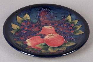 A MOORCROFT POTTERY 'FINCHES AND BERRIES' CHARGER, painted and tube lined, impressed mark and