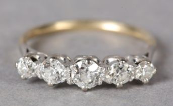 A FIVE STONE DIAMOND RING, c1940 in 18ct yellow and white gold, the graduated Old European and