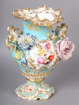 A 19TH CENTURY FLOWER ENCRUSTED VASE the body painted with sprays of flowers and heavily applied