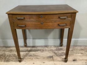 An oak veneered two drawer table canteen containing a suite of silver plated cutlery for twelve