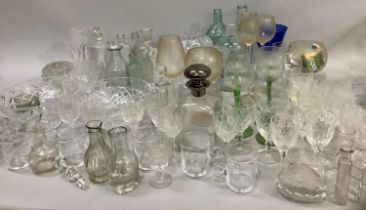 A quantity of glassware including Dartington glass coffee mugs, wines, cut and moulded glass