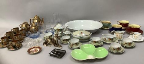 A quantity of china comprising a childrens doll's tea set with tureen, plates, cups, saucers and