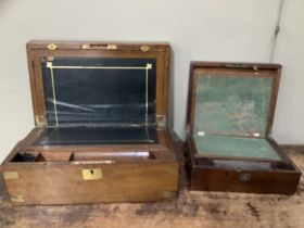 A Victorian oak brass bound writing slope with leather incised surface and compartments 41.5cm x