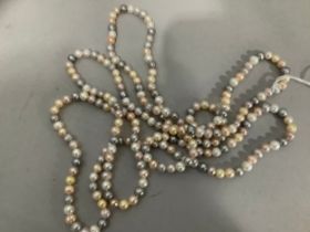 A necklace of stained and natural coloured fresh water cultured pearls, 6mm - 7mm, approximate