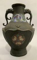 A Chinese bronze moulded vase, the body impressed with diapers and having cloisonne panels, the