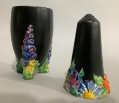 A Clarice Cliff Bizarre 'My Garden' vase on black ground the feet modelled as foxgloves 15cm high,