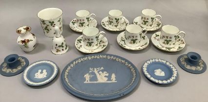 A Wedgwood Wild Strawberry pattern coffee service of six cans and saucers, a vase, and a bell