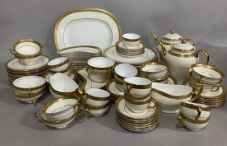 Minton Buckingham gilt pattern dinner and coffee service comprising thirteen dinner plates, twelve