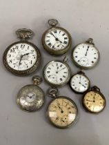 An early 20th century oversize pocket watch in a railway embossed open faced nickel case, white