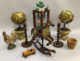 A pair of decorative gilt urns with flowerheads, a wooden horse, jointed frog, carved cockerel, pair