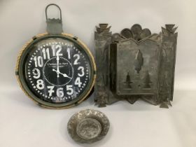 A metal panel wall mounted tea light holder together with a garden/conservatory clock with hanging