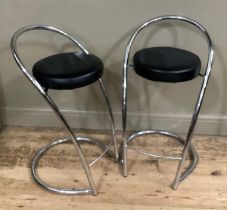 A pair of chrome framed bar stools