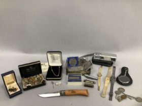 A collection of costume jewellery, pocket knives, coins, ladies wristwatches