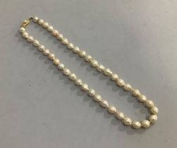 A necklace of baroque cultured pearls, each approximately 7mm diameter, approximate length 44cm