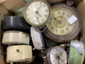 A collection of mid 20th century alarm clocks