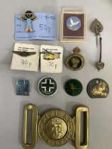 A collection of badges including a WWII Women's Land Army enamel badge, Shirebrook Colliery tag No