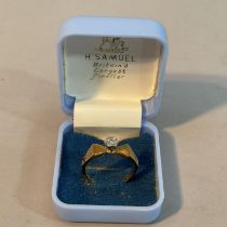 A single stone eight cut diamond ring illusion set in yellow and white metal (tests as 18ct white