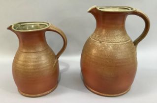 A large ash fired stoneware jug by Alastair Hardie (b.1941) having a green ash internal glaze,