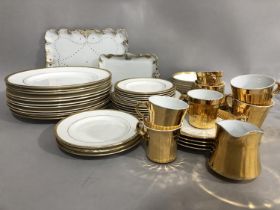 A quantity of gilt tableware including Royal Doulton Royal Gold, Crown Staffordshire, two Limoges