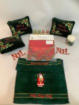 Three green velvet embroidered Merry Christmas cushions, Christmas scented candle, further box of