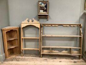 A set of open pine wall shelves with two shelves and three open compartments, 105cm wide together