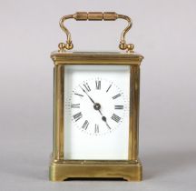 A late 19th century French carriage clock time piece, with 8-day cylinder movement in a brass and