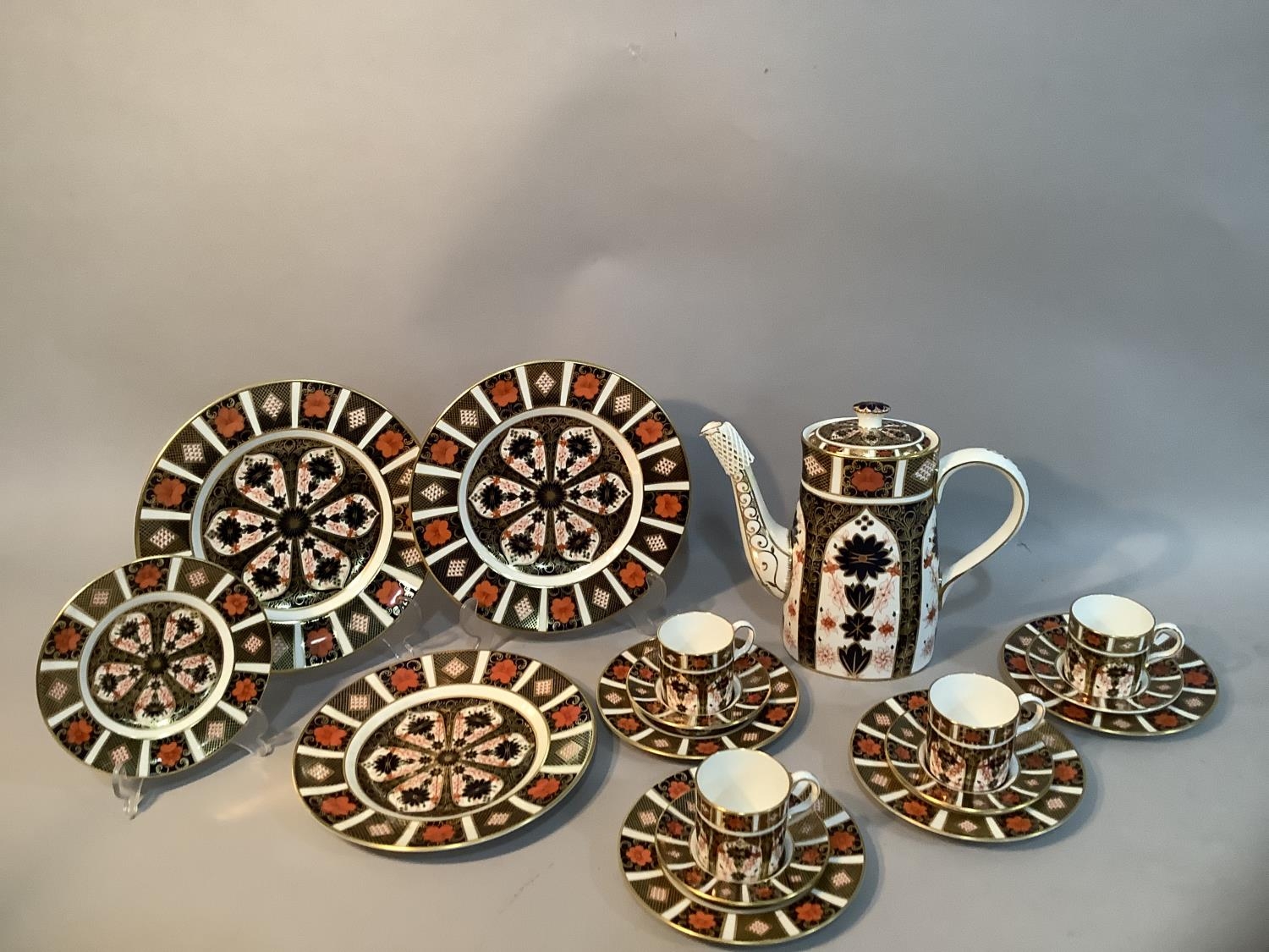 A Royal Crown Derby Old Imari pattern no.1128 coffee service comprising a coffee pot, four coffee - Image 3 of 3