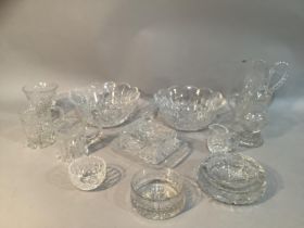 A pair of cut glass trifle bowls, a pair of etched glass mugs, a Yeoman coaster, an ashtray, a