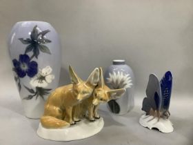 A Porcelain de Paris figure group of two Fennec foxes on a naturalistic base, two Royal Copenhagen