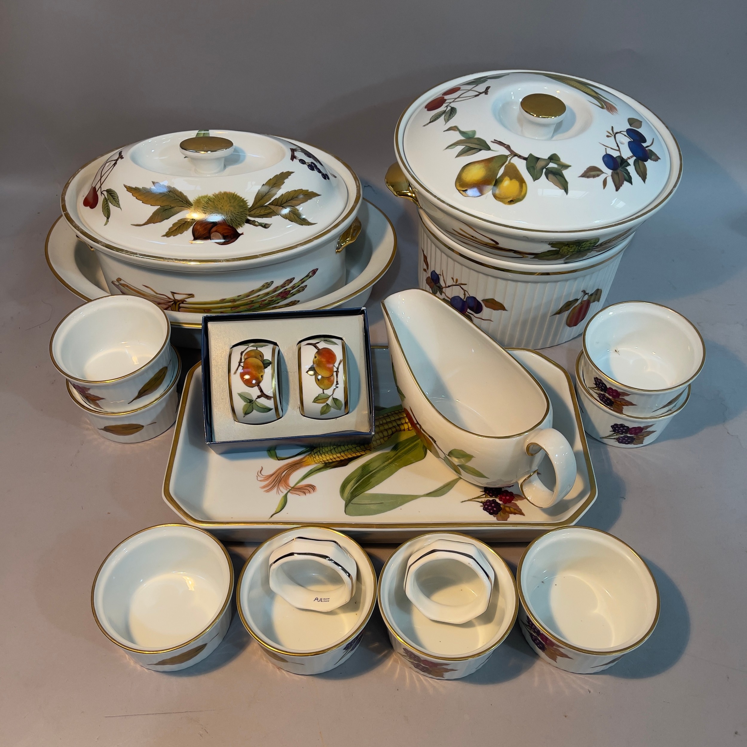 A quantity of Royal Worcester Evesham oven to table ware including oval tureens and covers,