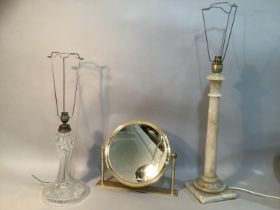An onyx colonnade table lamp base 52cm high and a cut glass example, 31cm high