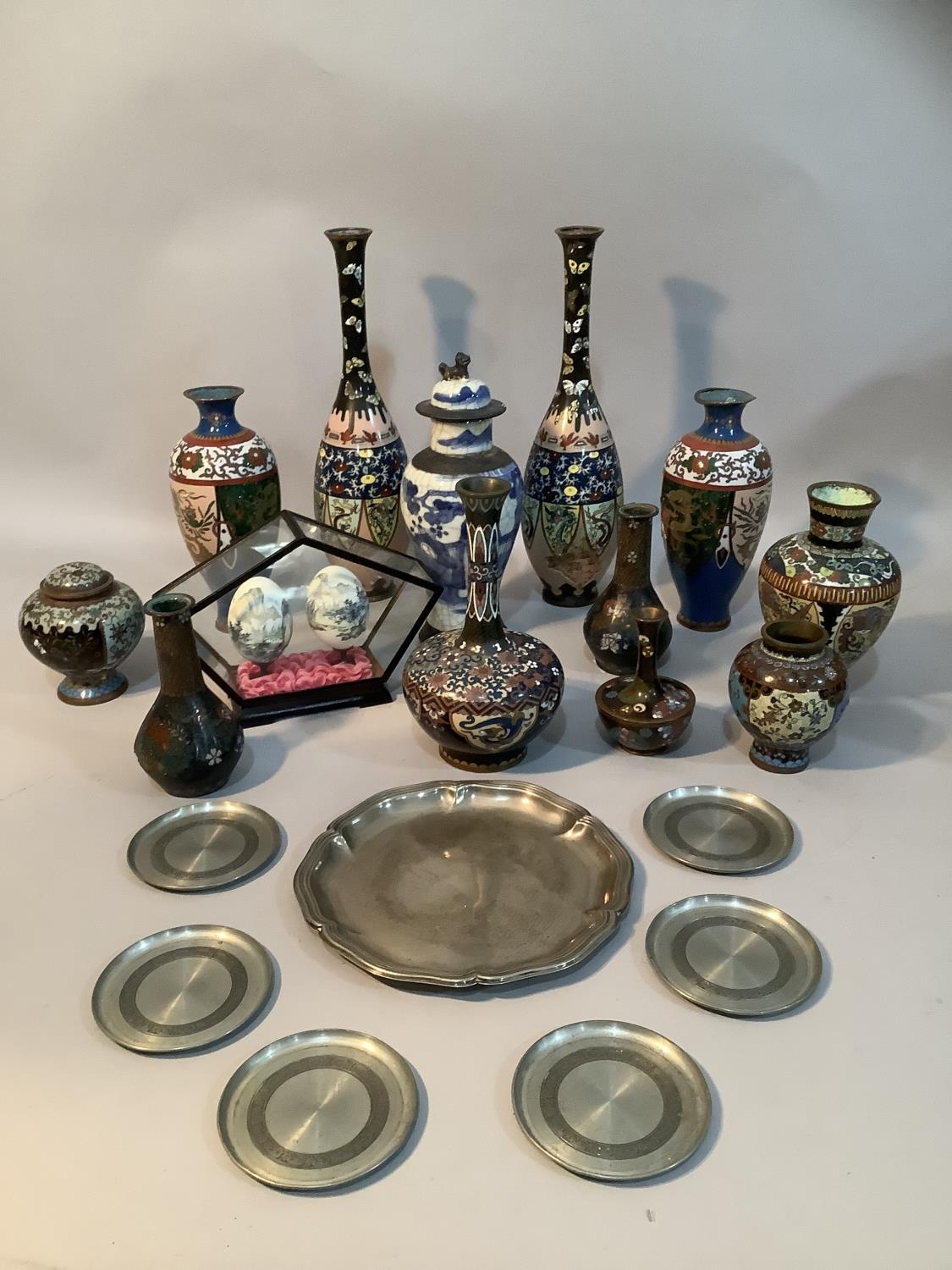A collection of Chinese Cloisonné ware, including two pairs of vases, odd vases, vase and cover etc.