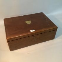 A mahogany box having twin brass inset handles by Walker & Hall containing a cased set of mother