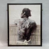 Four black and white photographic prints of people with tattoos, two of 20th century women and two