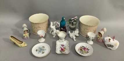 A Minton egg cup, two Royal Albert egg cups, three Royal Crown Derby pin dishes, two Royal Worcester