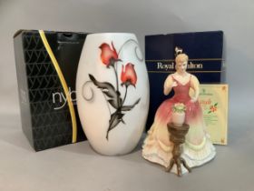 A Nybro Swedish glass vase and a Royal Doulton 'Sarah' figurine in original box with certificate